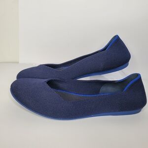 Rothy's The Flat in navy blue knit with a round toe and royal blue trim Size 7.5